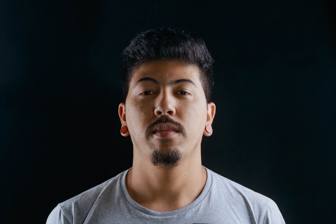 Studio portrait of a Brazilian man with short beard